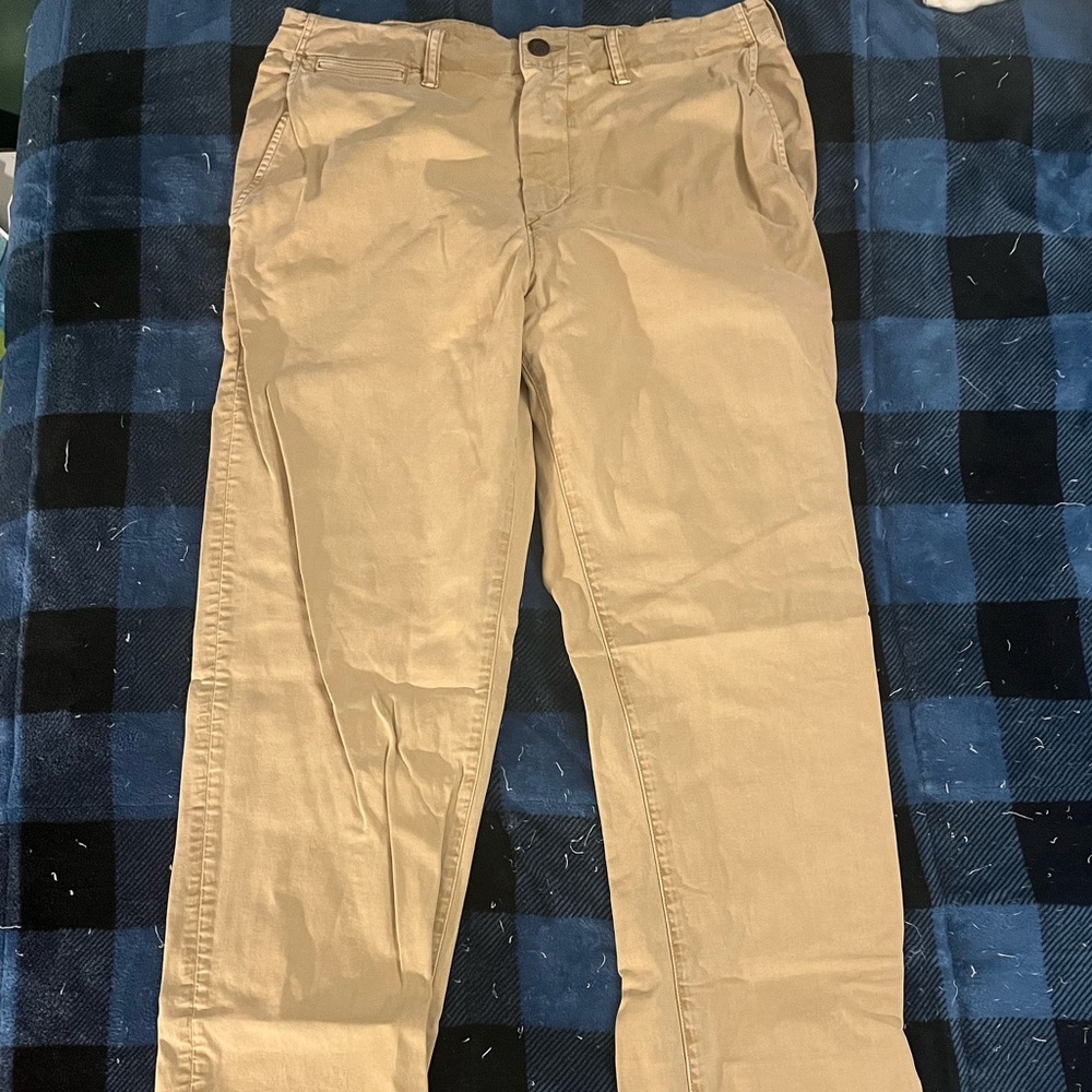 Tan American eagle dress pants. 34x36